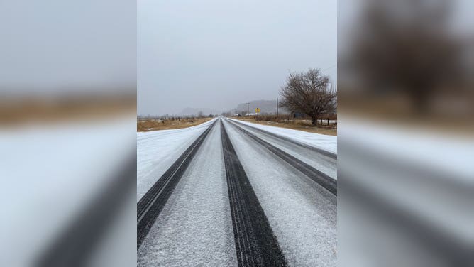 Some light snow accumulations and wet pavement in Fort Davis, Texas on Jan. 20, 2022.