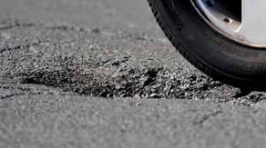 Bumpy ride: Crews begin filling potholes across the Northeast to prevent costly car repairs