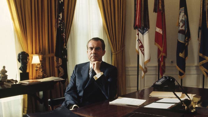 President Richard Nixon in the Oval Office.