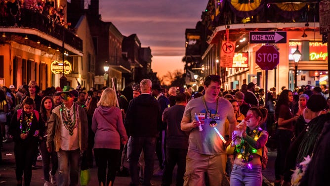 A crowd on Bourbon Street during Mardi Gras 2020 in New Orleans.