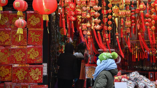 Red lanterns and other decorations on display at a Lunar New Year celebration in Chinatown in NYC.