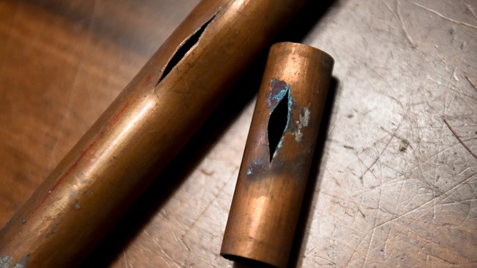 FILE - When water freezes in pipes, they may burst, resulting in flooding throughout a house.