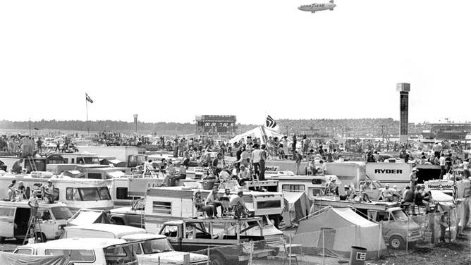 DAYTONA BEACH, FLORIDA - FEBRUARY 1981: The Goodyear blimp Enterprise flies over the crowded speedway iinfield during the running of the 1981 Daytona 500 stock car race at Daytona International Speedway in Daytona Beach, Florida. (Photo by Robert Alexander/Getty Images)