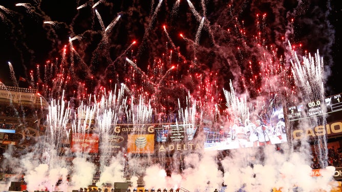Fireworks are set off following the 2014 Coors Light NHL Stadium Series Game between the New York Rangers and the New York Islanders at NYC's Yankee Stadium on January 29, 2014.