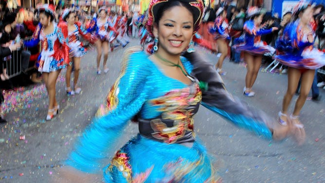 Dancers perform in a Lunar New Year parade in February 2010, the last year of the tiger.