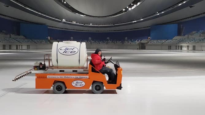 Ice maker builds the ice at the National Speed Skating Oval at the Beijing Olympics 2022.