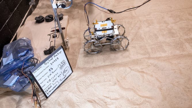 An Astrobotic CubeRover in the Lunar Regolith Lab at its headquarters in Pittsburgh, Pennsylvania. 