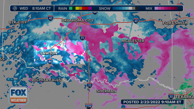 Doppler radar imagery from 8:10 a.m. Central time showed lightning strikes (inside the box) over parts of Oklahoma while sleet and freezing rain (shown in pink) were falling across the state.