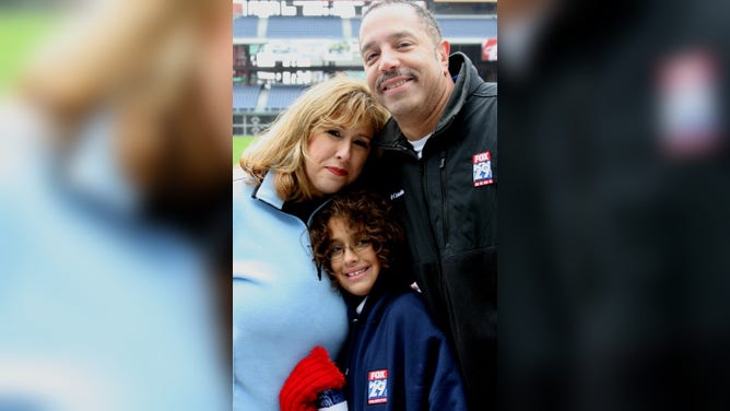 Serio with her husband and daughter.