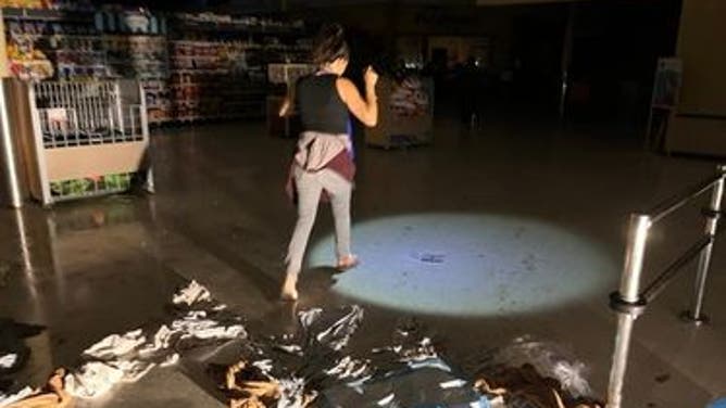 Texas Humane Heroes go into a tornado-damaged PetSmart in Round Rock, Texas to rescue dogs. (Image credit: Texas Humane Heroes)