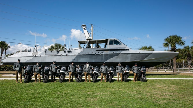 Retired Navy SEALs part of the Twistin' the Arm of the Frogman charity ride in Fort Pierce, Fla. 