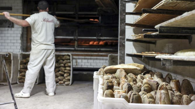 Loaves of freshly-baked bread stored in crates at a bakery in Rome, Italy, on Wednesday, March 9, 2022. Wheat futures swung wildly between gains and losses Tuesday after climbing to unprecedented heights as Russia's attack on Ukraine disrupts global food supplies. Photographer: Alessia Pierdomenico/Bloomberg via Getty Images