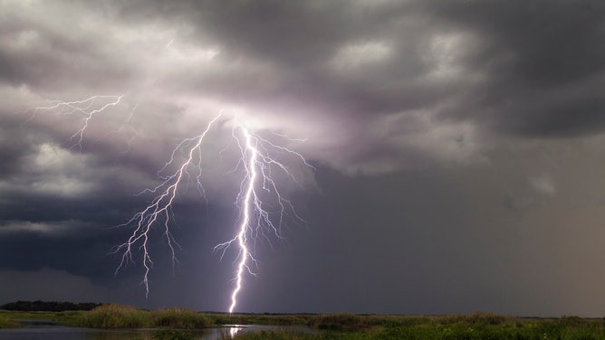 lightning from a summer thunderstorm pictured in Christmas, Florida. Florida is the lightning capital of the country.