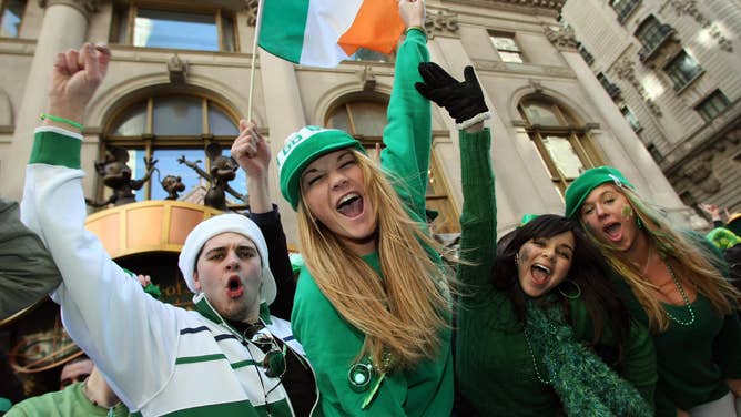 Parade watchers cheer on marching bands as they make their way up 5th Avenue during the St. Patrick's Day Parade on March 17 , 2008 in New York.