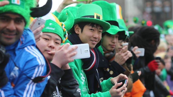 Crowd at a St. Patrick's Day parade.