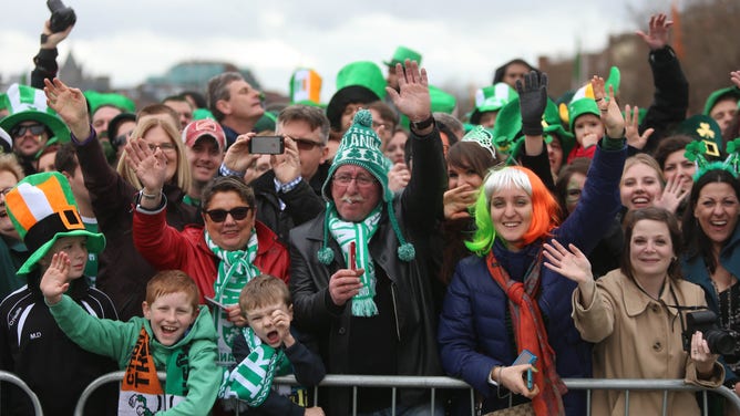 Crowd at a St. Patrick's Day parade.