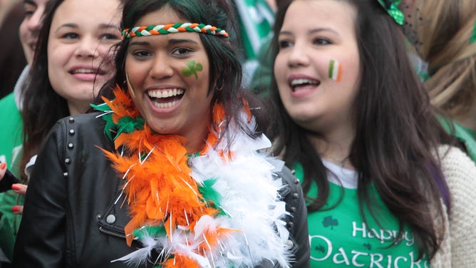 Crowd at a St. Patrick's Day parade.