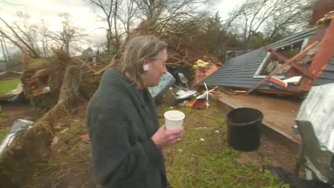 Frances Martin surveys what's left of her home.