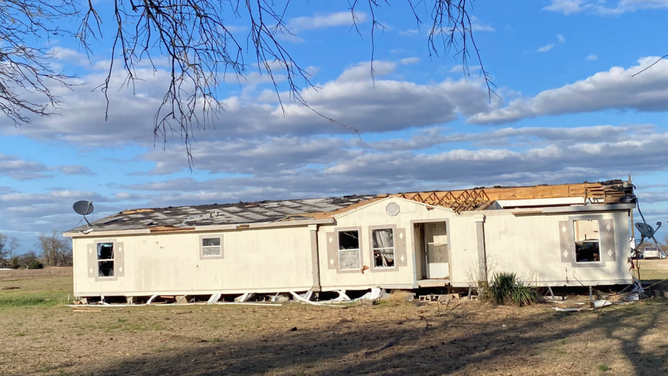 The roof and windows were blown out of a mobile home by Monday's tornado.