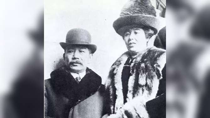 Viscountess Iwa Chinda stands next to her husband, the Japanese Ambassador. 