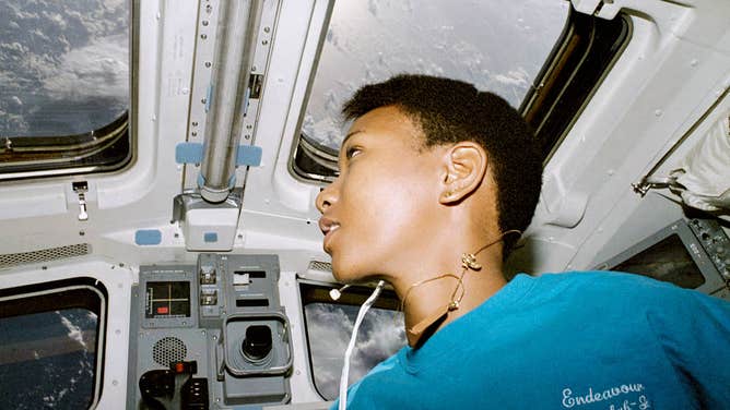 Mae Jemison is an engineer, physician and former NASA astronaut. In this image, she looks out the aft flight deck ports on Space Shuttle Endeavour's STS-47 mission in 1992.