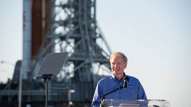 NASA Administrator Bill Nelson in front of the SLS rocket at Kennedy Space Center, Fla.