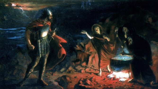 A storm brews in the background as Macbeth approaches the witches.