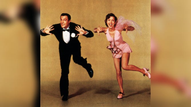 Gene Kelly and Debbie Reynolds on an advertisement for "Singin' in the Rain".