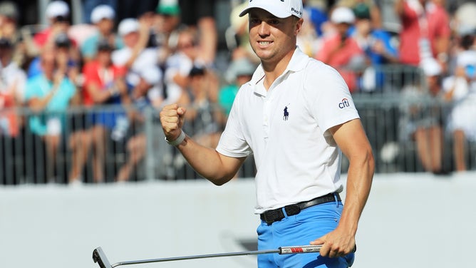 Justin Thomas of the United States celebrates on the 18th green after winning during the final round of the BMW Championship at Medinah Country Club No. 3 on August 18, 2019 in Medinah, Illinois.