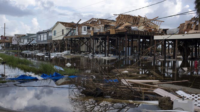 Homes destroyed after Hurricane Ida in the Coco Village near Cocodrie, Louisiana, U.S., on Wednesday, Sept. 1, 2021. The electric utility that serves New Orleans has restored power to a small section of the city after Hurricane Ida devastated the region's grid.