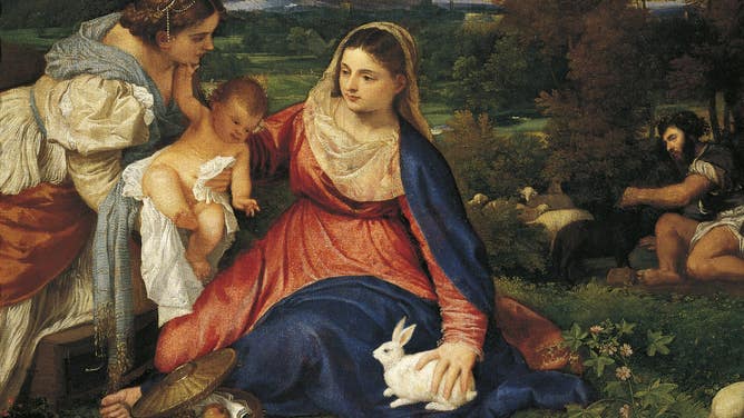 The Virgin Mary is depicted with her left hand on a rabbit in the painting "The Madonna of the Rabbit" ca. 1530.