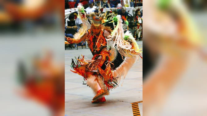 A young man participates in an inter-tribal dance at the Gathering Of Nations PowWow on April 25, 2003 in Albuquerque, New Mexico.