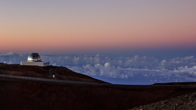 The NASA Infrared Telescope Facility (IRTF) at sunset at the Mauna Kea Observatories Summit on the Big Island of Hawaii. The observatory is place on the island highest point to see the clearest view of the stars.