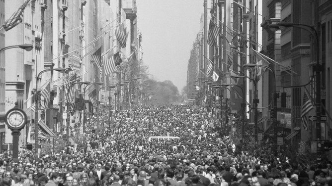 Crowds pack 5th Avenue in New York City during the city's first Earth Day celebration in 1970.