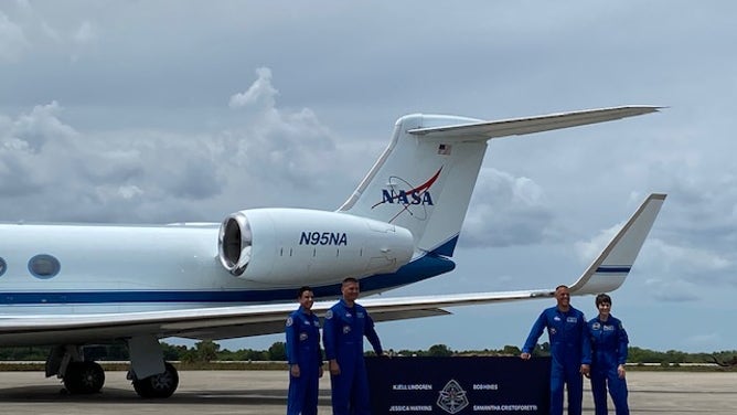 Crew-4 Mission Commander Kjell Lindgren, Pilot Bob Hines, and Mission Specialist Jessica Watkins, all of NASA, and Mission Specialist Samantha Cristoforetti of ESA (European Space Agency at the Launch and Landing Facility at Kennedy Space Center, Fla. on April 18, 2022. (Image: Emilee Speck/FOX Weather)