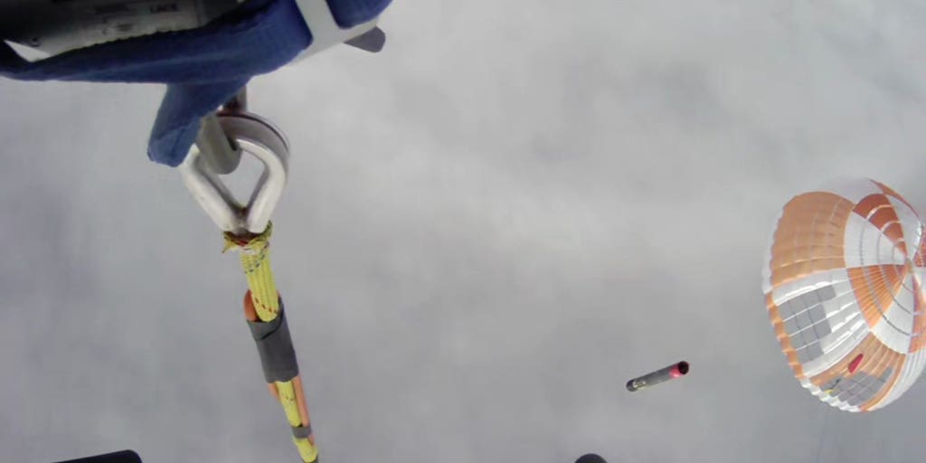 Rocket Lab snatches rocket out of the sky using a helicopter on its ...