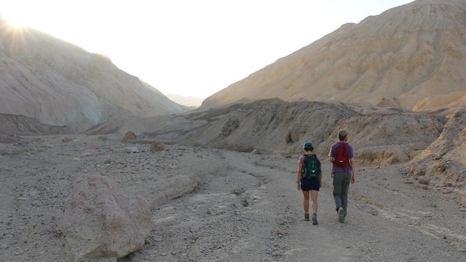 Hikers explore the geologic rainbow of Desolation Canyon, another location that provided a backdrop to the "Star Wars" saga.