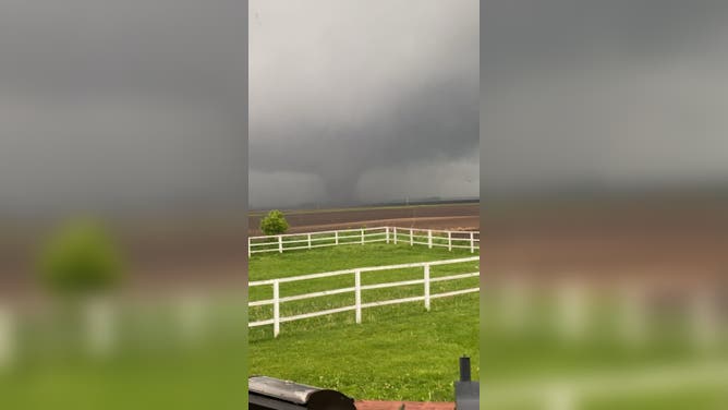 A possible tornado spirals through Milan, Minnesota on May 30, 2022. (Image: Janelle Streed / Weather Traker / TMX)