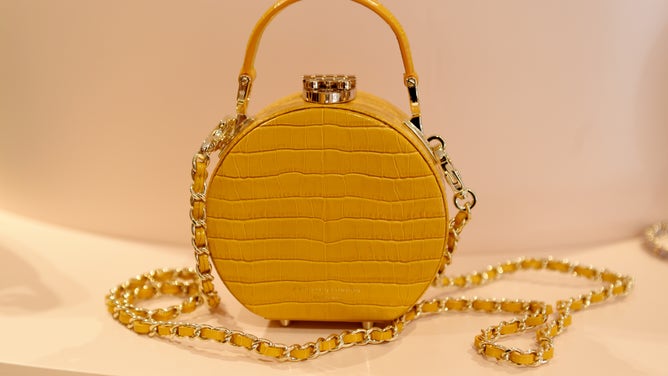 A yellow bag on display.