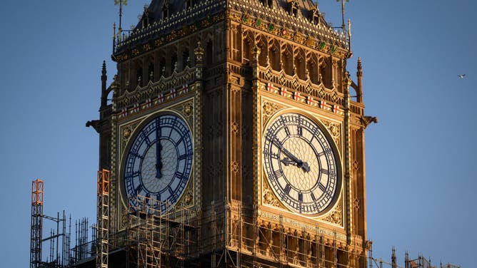 LONDON, ENGLAND - JANUARY 05: Two of the clock faces on Queen Elizabeth Tower, commonly referred to as Big Ben, are seen as renovation work nears completion, on January 05, 2022 in London, England. Parliament reconvenes today following the Christmas recess.