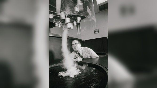 Fujita works in his lab with a special tornado simulator. 