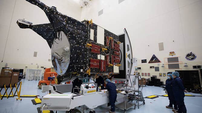 The Psyche spacecraft in the Payload Hazardous Servicing Facility at NASA's Kennedy Space Center in Florida. (Photo credit: NASA/Isaac Watson)