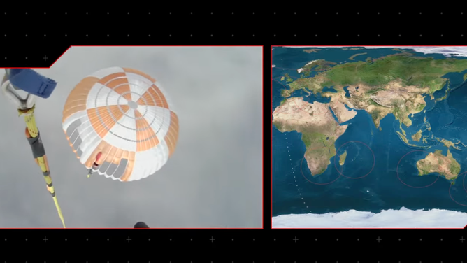 The Electron main parachute below the helicopter. (Image: Rocket Lab livestream)