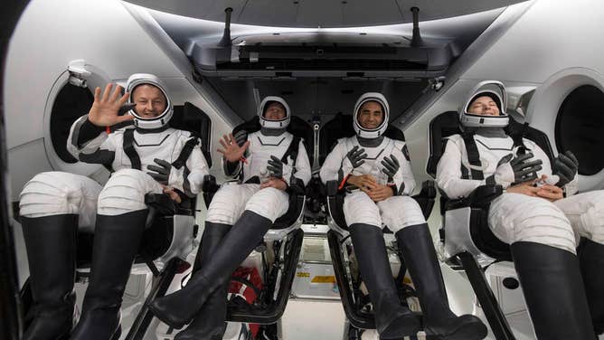 From left to right, ESA (European Space Agency) astronaut Matthais Maurer, NASA astronauts Tom Marshburn, Raja Chari, and Kayla Barron, are seen inside the SpaceX Crew Dragon Endurance spacecraft onboard the SpaceX Shannon recovery ship shortly after having landed in the Gulf of Mexico off the coast of Tampa, Florida, Friday, May 6, 2022. Maurer, Marshburn, Chari, and Barron are returning after 177 days in space as part of Expeditions 66 and 67 aboard the International Space Station. Photo Credit: (NASA/Aubrey Gemignani)