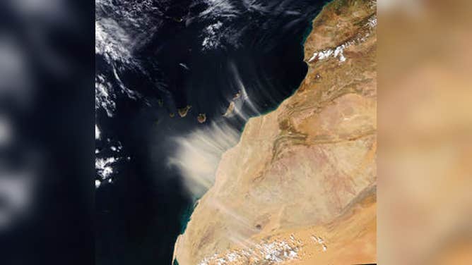 On Jan. 14, 2022, strong seasonal winds carried dust from northwest Africa over the Canary Islands, causing visibility to drop and air quality to decline. EMIT measures the mineral composition of dust in Earth's arid regions, creating a map that could improve understanding of how dust affects people and communities. Credits: NASA