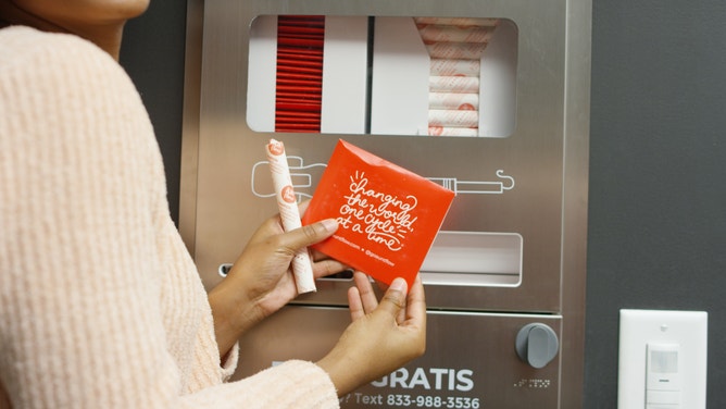 An Aunt Flow dispenser with 100% organic pads and tampons. (Image: Aunt Flow)