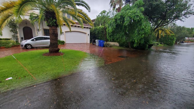 Flooded streets in Pompano Beach, Florida during high tide after nearly 10 inches of rain on Saturday, June 4, 2022. (Image: JeffYastine/Twitter)
