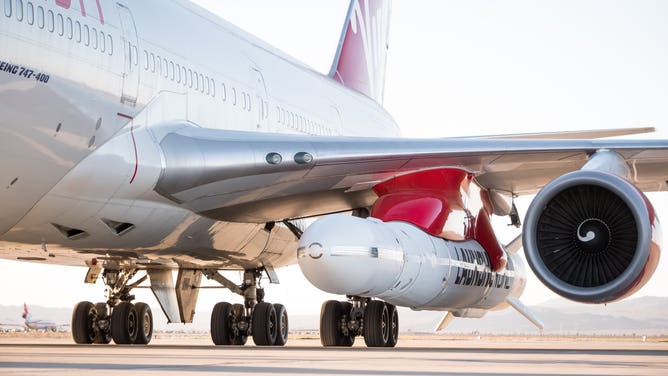 Virgin Orbit's Cosmic Girl with the LauncherOne rocket under its wing. (Image: Virgin Orbit)