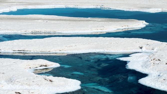 Ojos del Salar. groundwater ponds and surface of the Salar predominantly natriumchloride. Landscape on the salt flats Salar Salinas Grandes in the Altiplano. South America. Argentina. (Photo by: Martin Zwick/REDA&amp;CO/Universal Images Group via Getty Images)