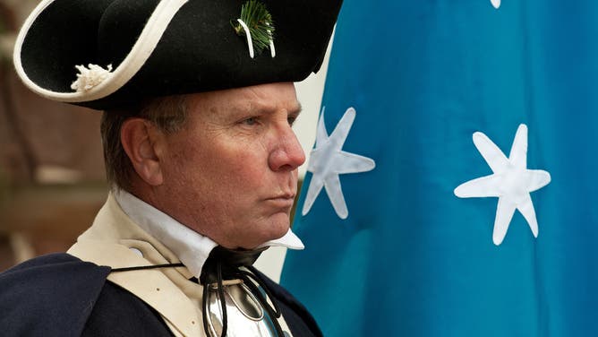 A reenactor plays General George Washington during the American Revolutionary War.